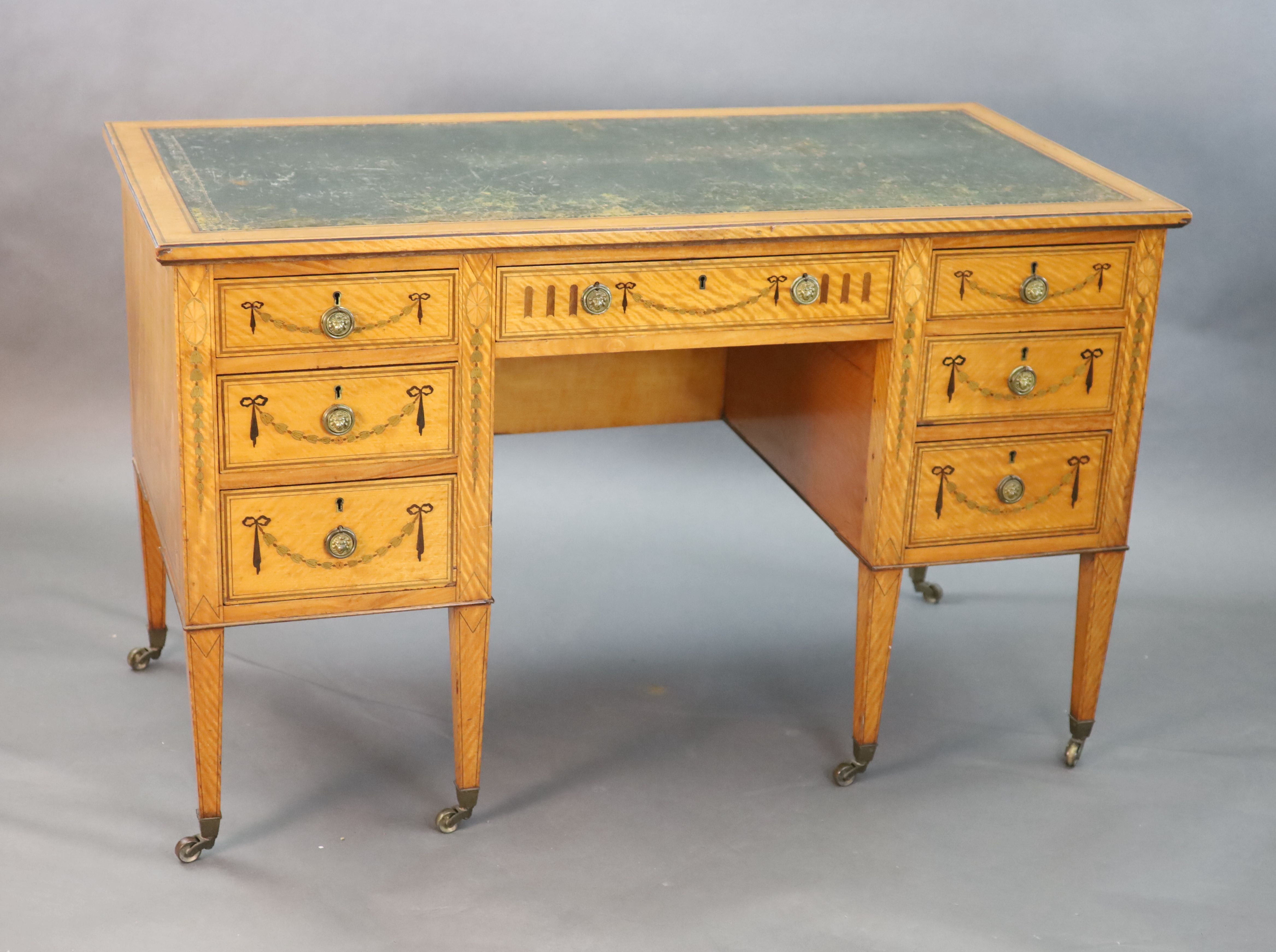 An Edwardian Edwards & Roberts marquetry inlaid satinwood kneehole desk, W.4ft D.2ft H.2ft 6in.
